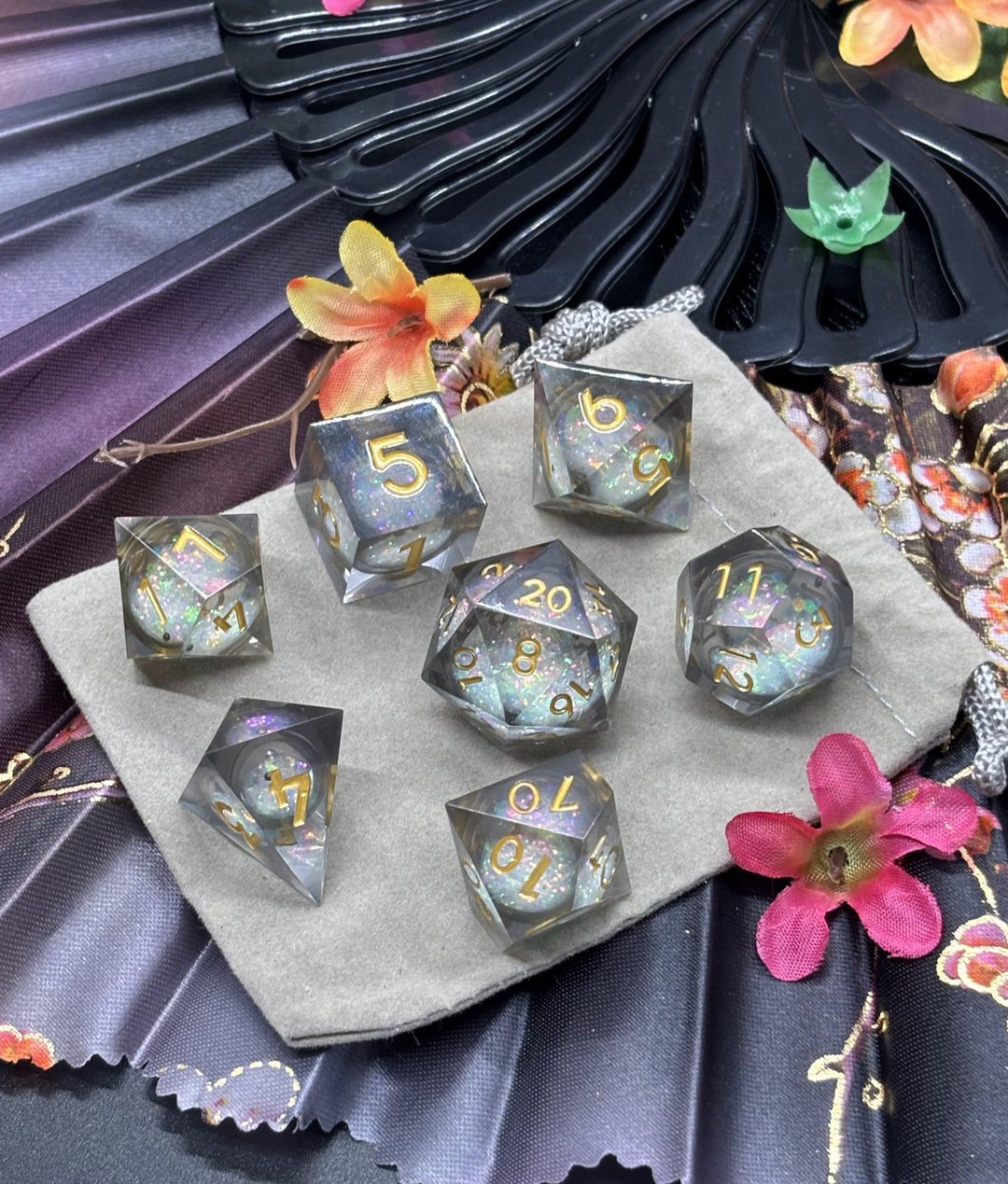 Black with prismatic glitter, gold font