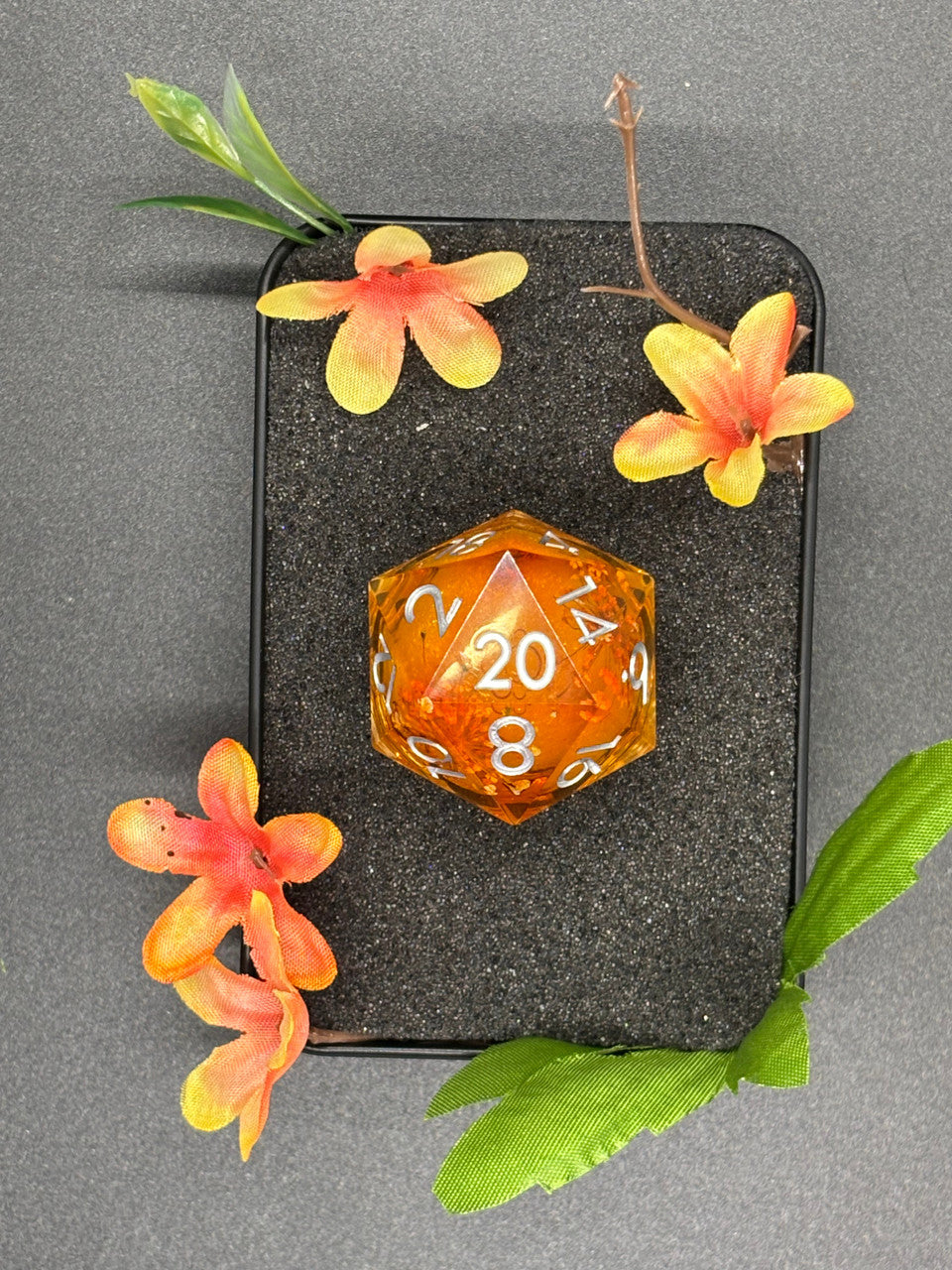 Orange with pressed flower