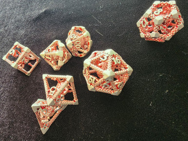 Beholder Hollow Metal Dice 7 pc Set Battleworn Red